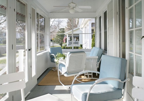 Beach-style-small-porch-white-wroght-iron-furniture-ocean-blue-cushion-ideas
