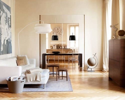 trendy-living-room-design-in-other-with-beige-walls-and-light-hardwood-floors
